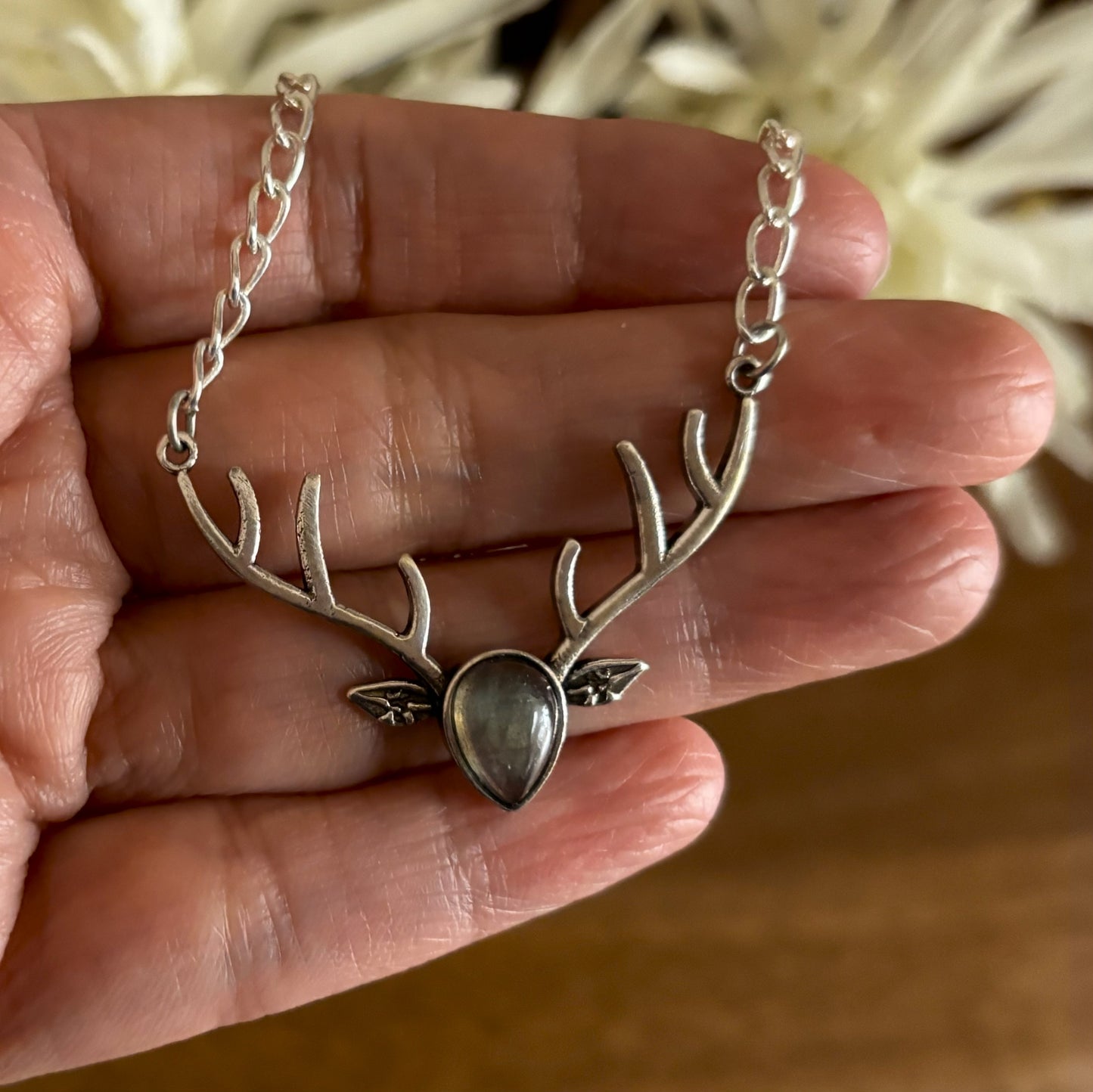 Gold and silver deer antler pendant with labradorite and moonstone