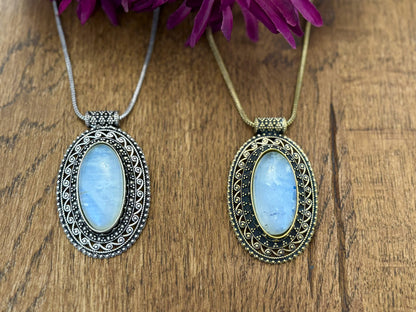 Large oval moonstone pendant necklace in vintage silver and antique gold