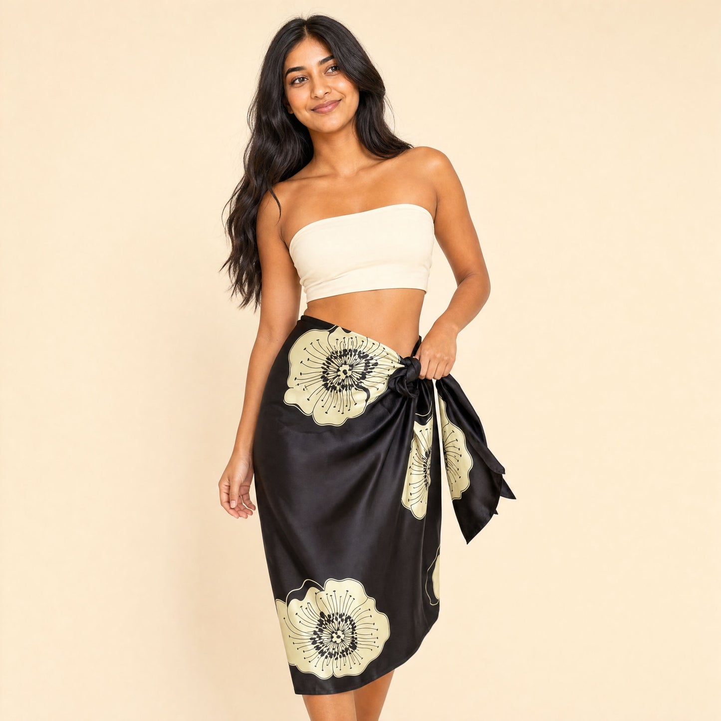 Black floral satin sarong — three-quarter view showing the side tie and satin fall