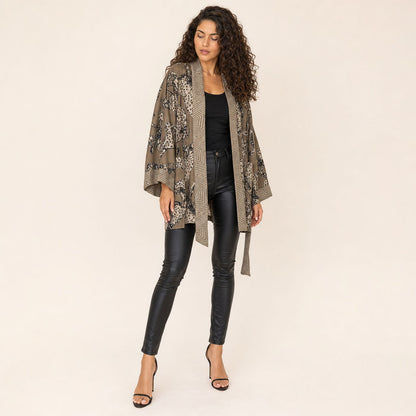 Leopard Print Satin Kimono — Untamed Earth three-quarter view showing drape and layering
