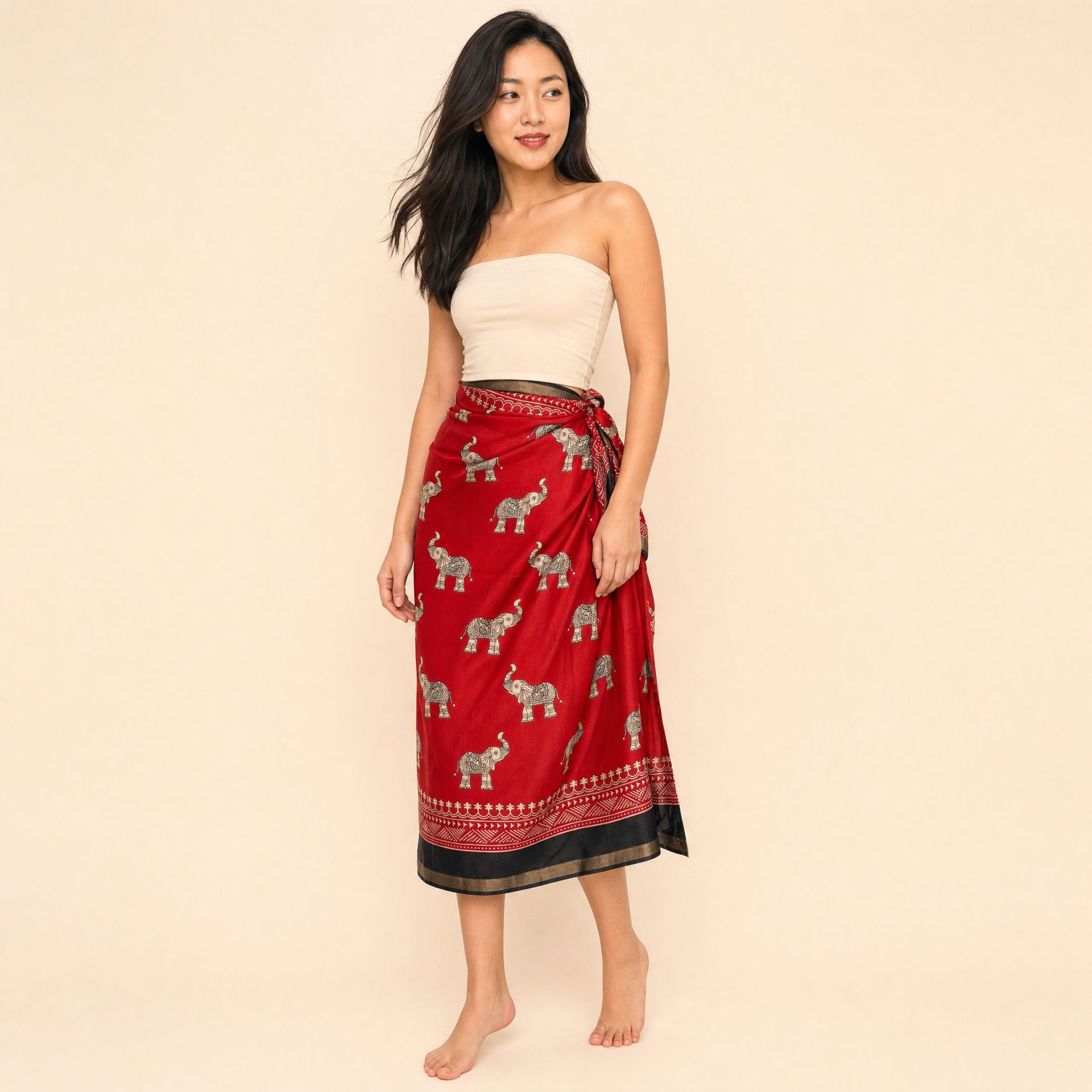 Elephant print Scarlet Tide sarong, three-quarter view showing the hip knot and drape