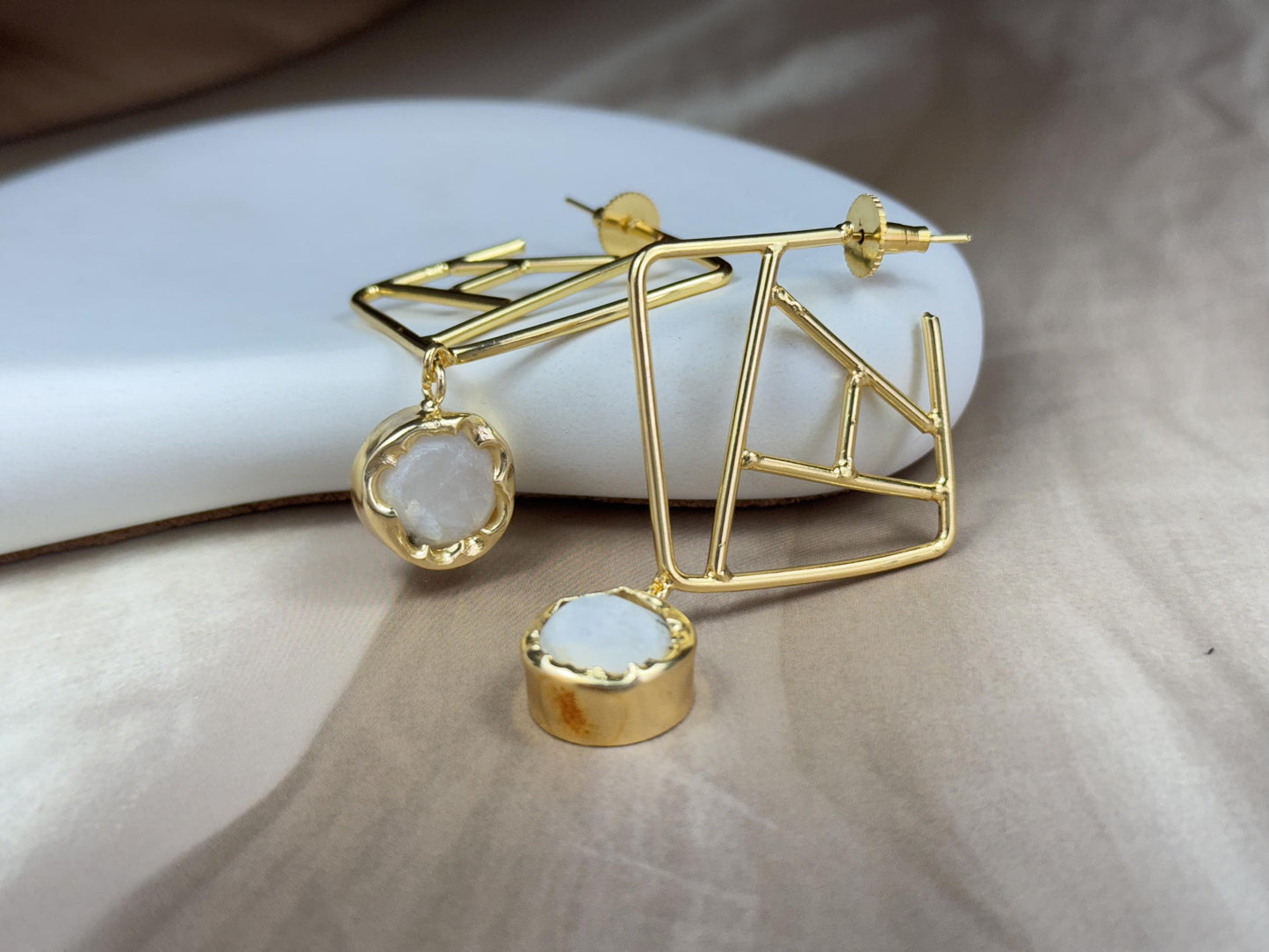 Geometric Gold Drop Earring with Faceted Gemstone.
