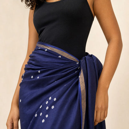 Close-up of the gold zari border and white bandhani print on Bandhani Cotton-Silk Sarong
