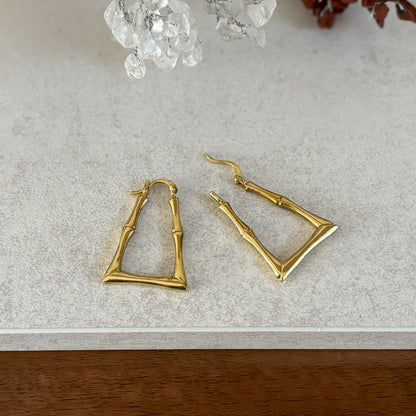 Close-up of the hinged latch-back closure on Polished Brass Bamboo Hoop Earrings — Golden Grove