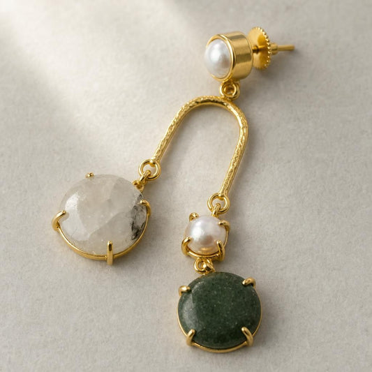Close-up of hammered gold U-arch and prong-set stones on Moonstone & Aventurine Cascade Earrings