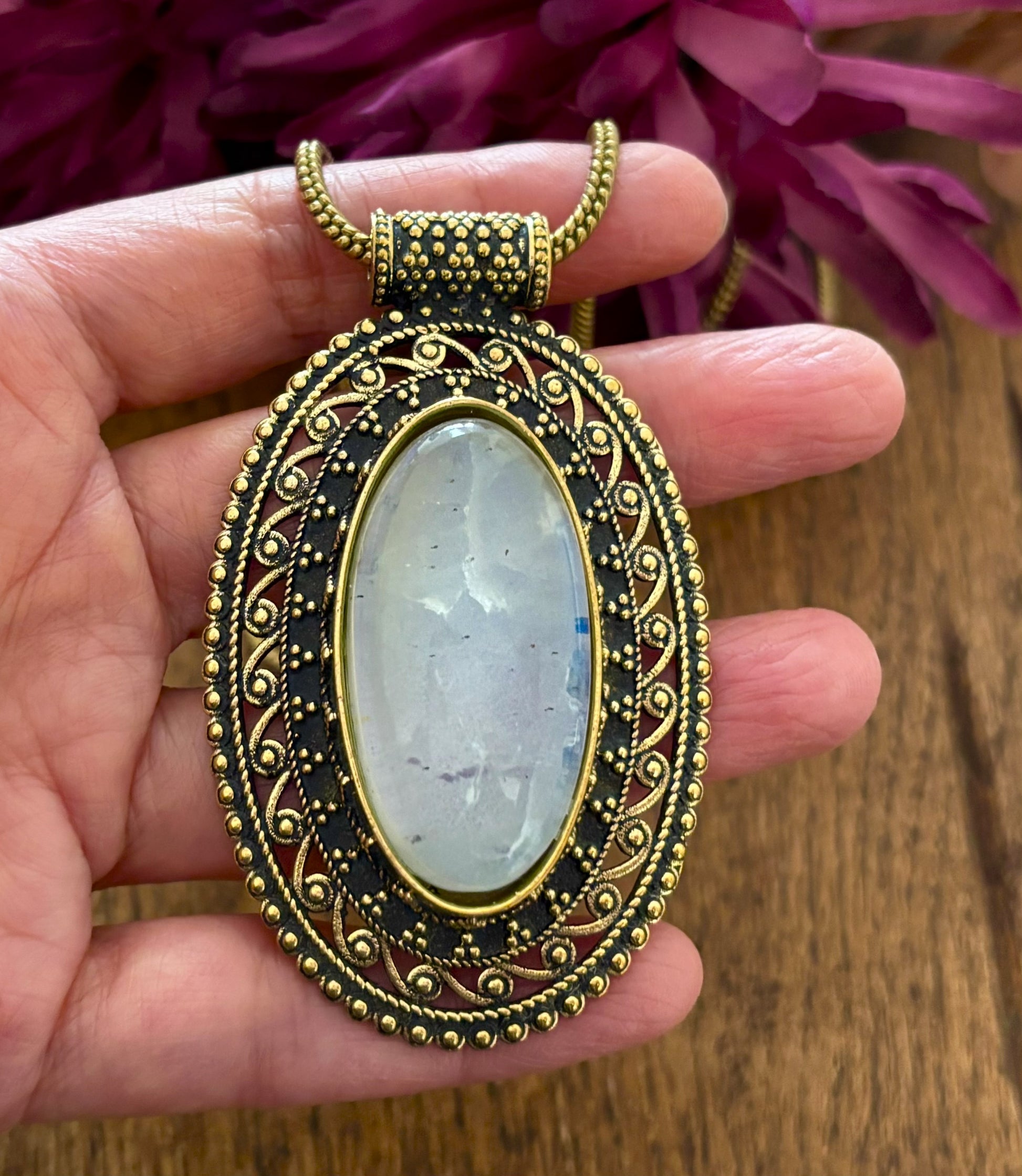 Large oval moonstone pendant necklace in vintage silver and antique gold