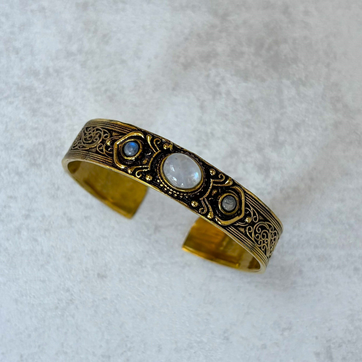 Moonstone brass cuff bangle with three natural moonstone cabochons — Aurora Moon by Boho Mantra
