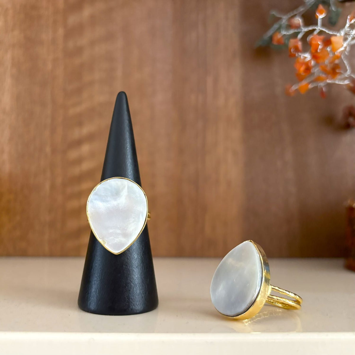 Mother of Pearl Teardrop Ring front and side views showing slim gold bezel and open split band (sold individually)