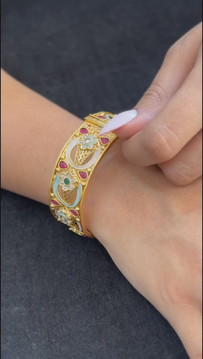 Pastel Floral Arch Kada - Unique pastel-toned openable kada with floral enamel work and teardrop rubies in oval layout.