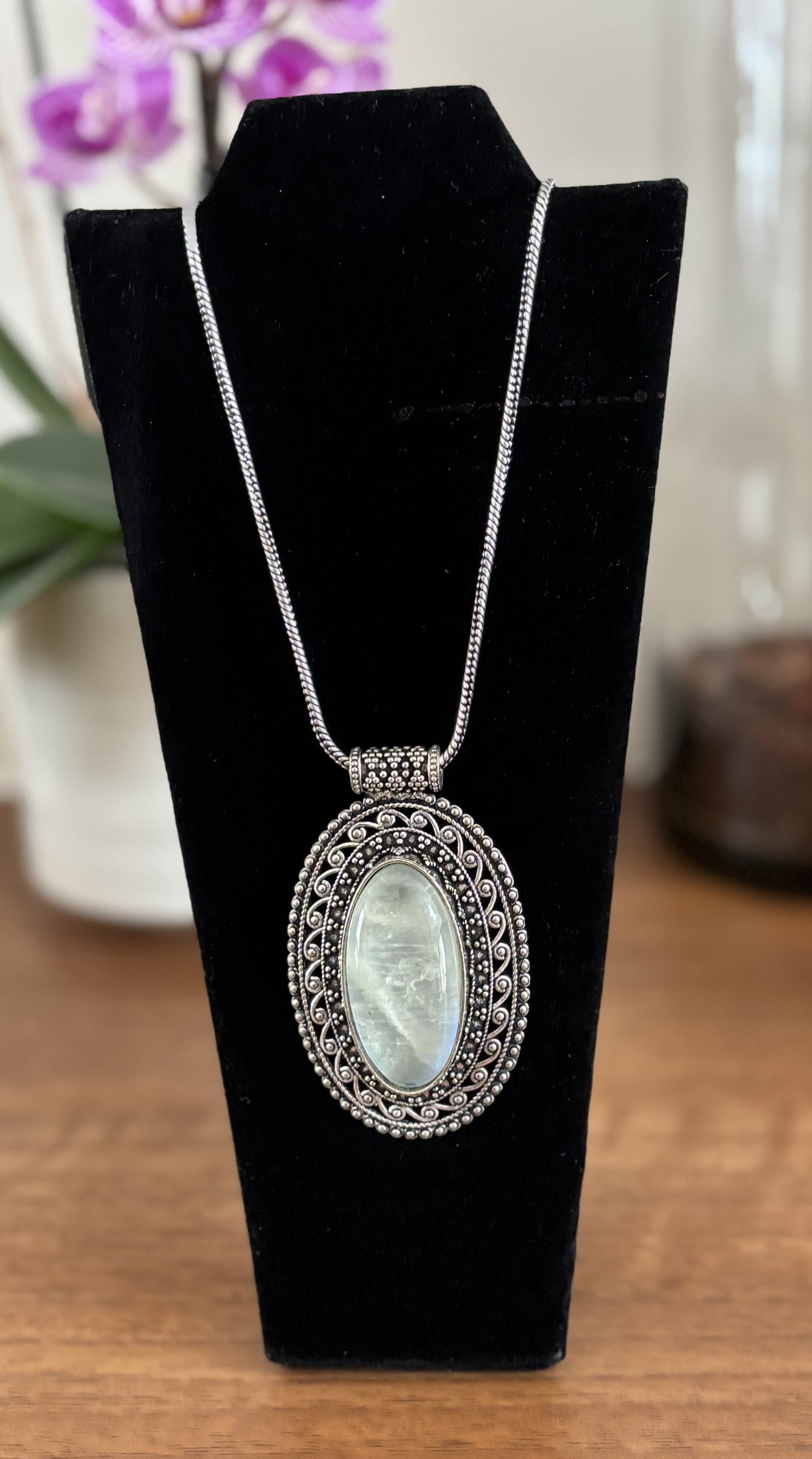 Large oval moonstone pendant necklace in vintage silver and antique gold