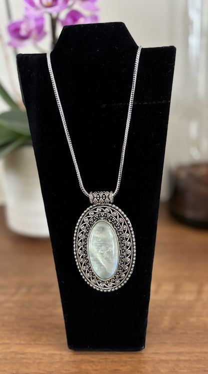 Large oval moonstone pendant necklace in vintage silver and antique gold