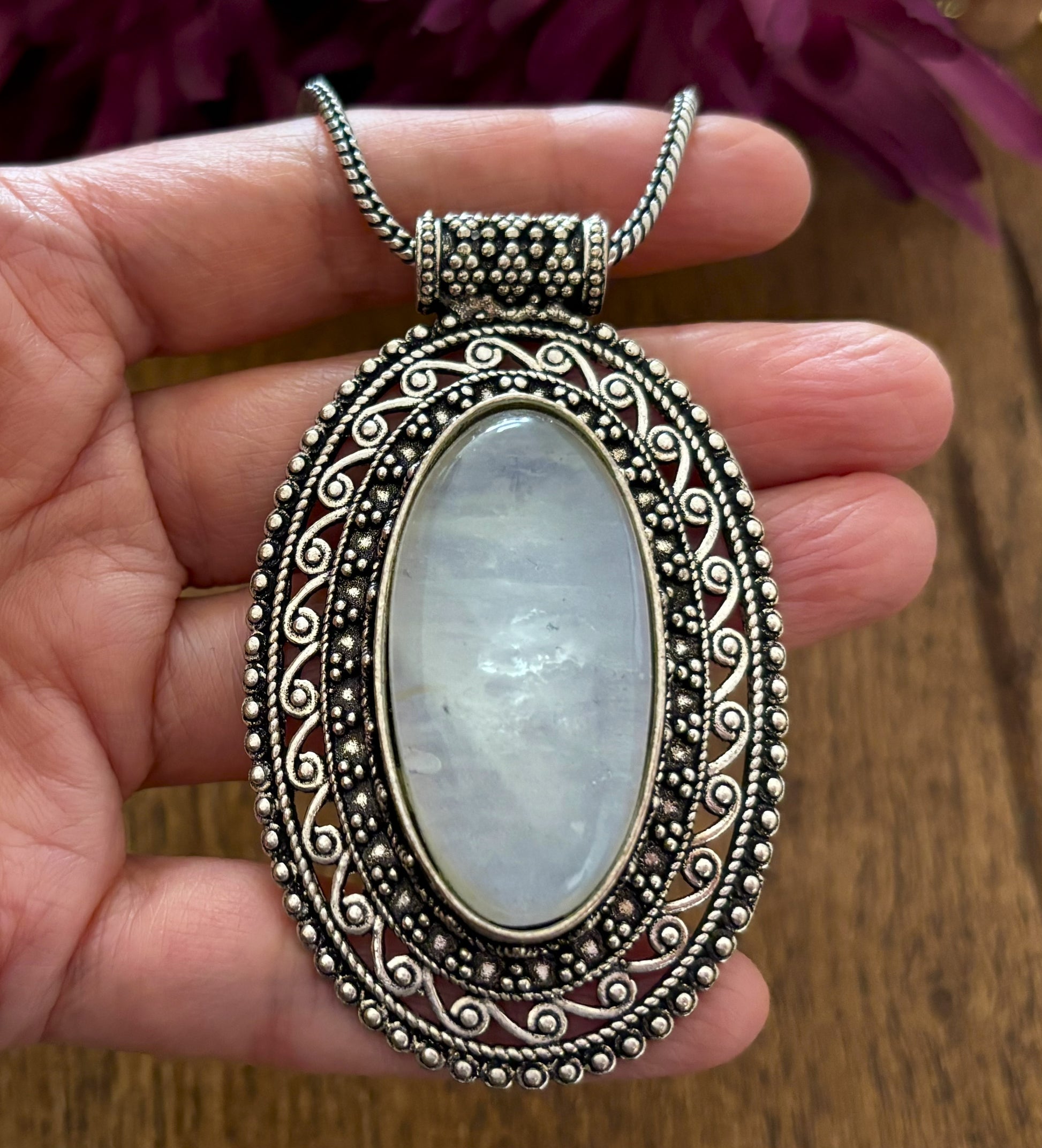 Large oval moonstone pendant necklace in vintage silver and antique gold