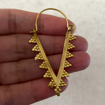 Granulated Brass Spike Hoop Earrings — Zahara, Small in warm unplated brass, held in hand