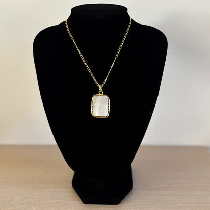 Mother of Pearl Pendant Necklace — Tidal Glow on a velvet bust, showing chain drape and pendant scale